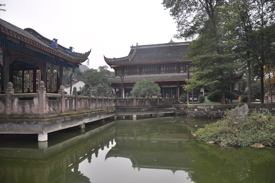 The Baoguang Temple is located in Xindu district 18 km north of Chengdu, China's Sichuan province. It was founded during the Tang Dynasty. The temples has a number of halls, including the Qing-era Arhat Hall, containing 500 two meter high clay figurines of Arhats. [China.org.cn /by Chen Xiangzhao]