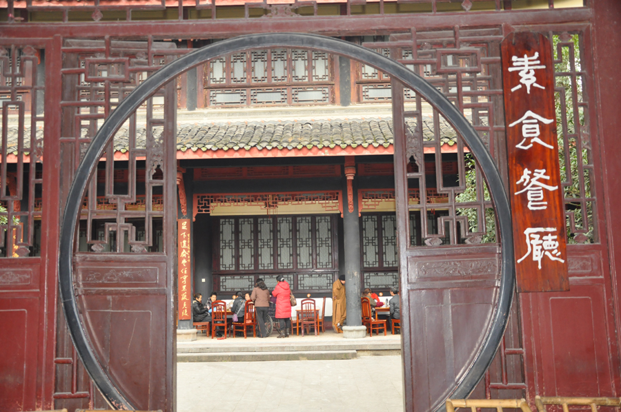 The Baoguang Temple is located in Xindu district 18 km north of Chengdu, China's Sichuan province. It was founded during the Tang Dynasty. The temples has a number of halls, including the Qing-era Arhat Hall, containing 500 two meter high clay figurines of Arhats. [China.org.cn /by Chen Xiangzhao]