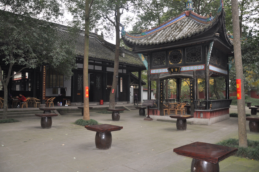 The Baoguang Temple is located in Xindu district 18 km north of Chengdu, China's Sichuan province. It was founded during the Tang Dynasty. The temples has a number of halls, including the Qing-era Arhat Hall, containing 500 two meter high clay figurines of Arhats. [China.org.cn /by Chen Xiangzhao]