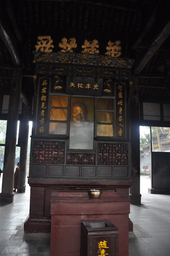 The Baoguang Temple is located in Xindu district 18 km north of Chengdu, China's Sichuan province. It was founded during the Tang Dynasty. The temples has a number of halls, including the Qing-era Arhat Hall, containing 500 two meter high clay figurines of Arhats. [China.org.cn /by Chen Xiangzhao]