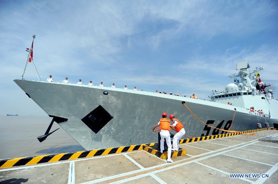 Frigate 'Yiyang' sets sail at a port in Zhoushan, east China's Zhejiang Province, July 3, 2012