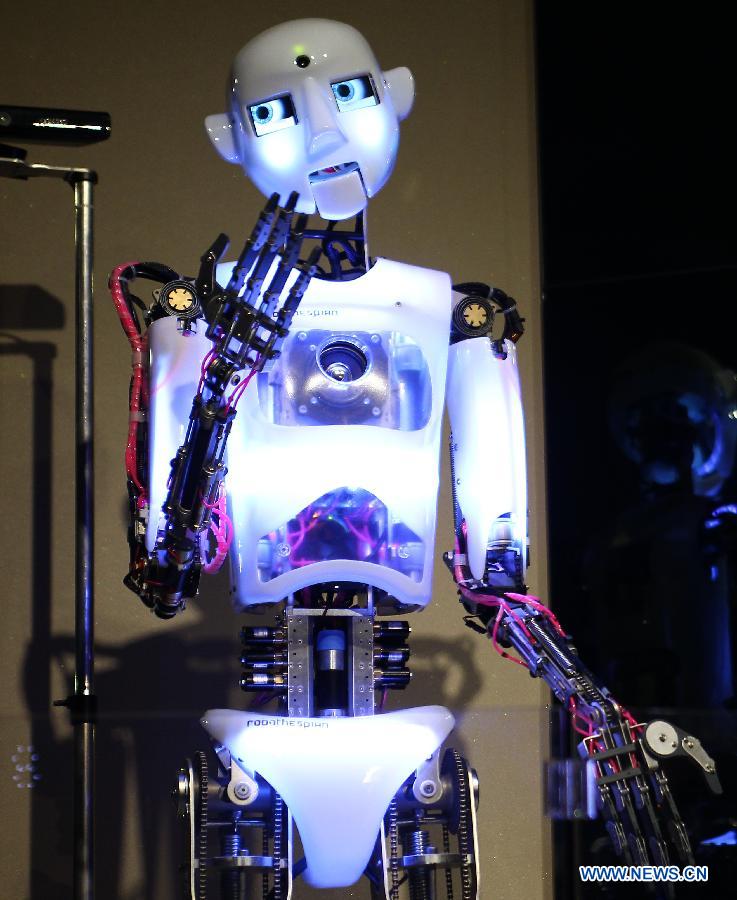 A singing robot performs in the Robot Story Expo in Taipei, southeast China&apos;s Taiwan, July 4, 2012. 