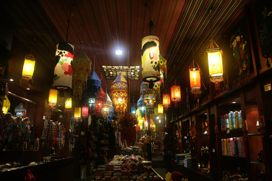 Colorful lamps are displayed in a shop in Fenghuang (phoenix) ancient town on June 28. [CnDG by Jiao Meng]