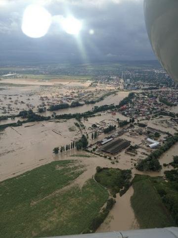 Torrential rains and flooding have killed more than 100 people in Russia's southern Krasnodar Territory. 