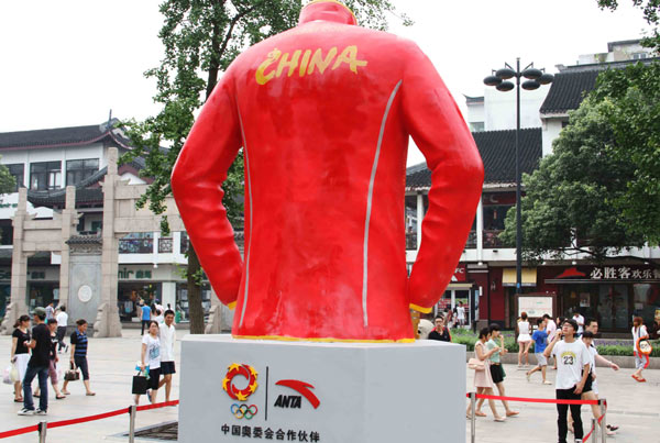 Olympic uniform sculpture unveiled across China