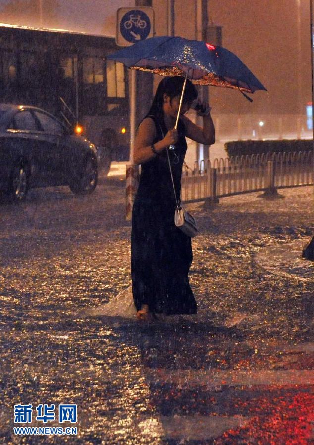 Beijing was hit by a torrential rain on Tuesday evening.