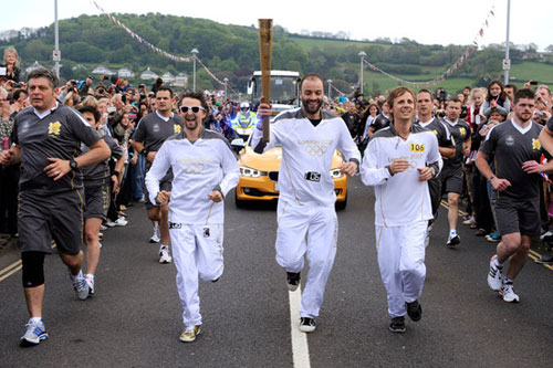 Muse are among the stars who have carried the Olympic torch on its lengthy tour of the UK.