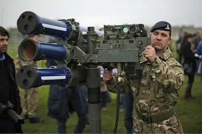 Britain put an extra 3,500 military personnel on standby on Wednesday to protect venues at the London Olympics