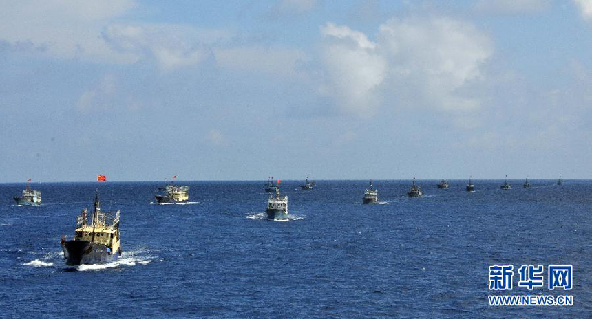 Fishing vessels arrive at Yongshu Reef of Nansha Islands, south China Sea, July 15, 2012. A fleet of 30 fishing vessels arrive at Yongshu Reef of south China Sea on Sunday. The fleet, departing from Sanya City of south China's Hainan Province on July 12, 2012, will spend 20 days fishing near the Yongshu Reef, sailors of the fleet said.