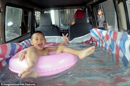 The six-year-old floats on an inflatable ring in his private 'pool.' [Agencies]