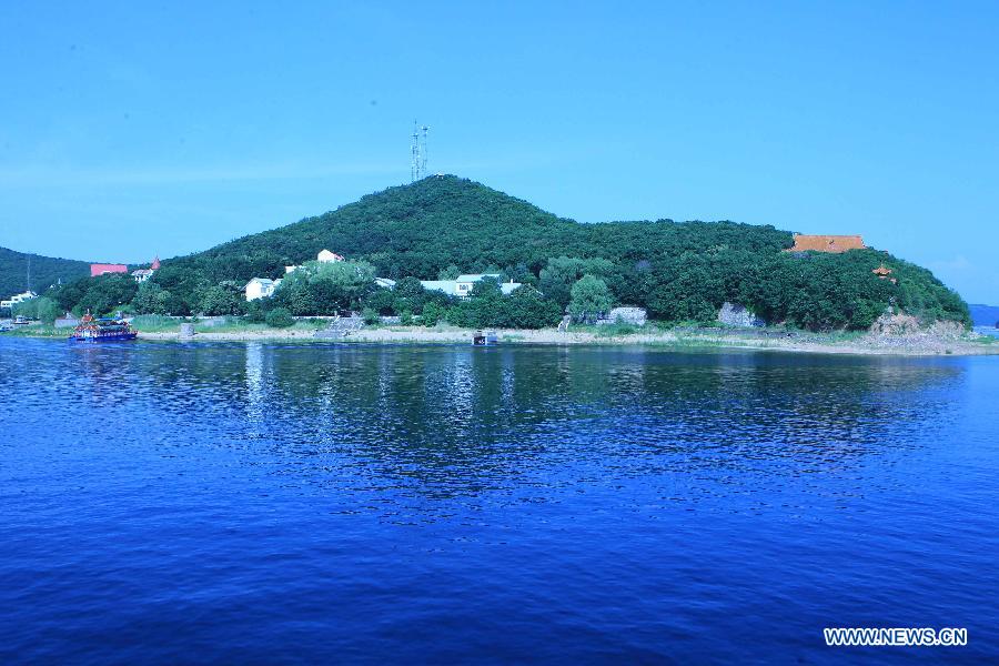 Photo taken on July 7, 2012 shows the scenery of the Jingbo Lake in Ning'an, northeast China's Heilongjiang Province. (Xinhua/Zhang Yanhui) 