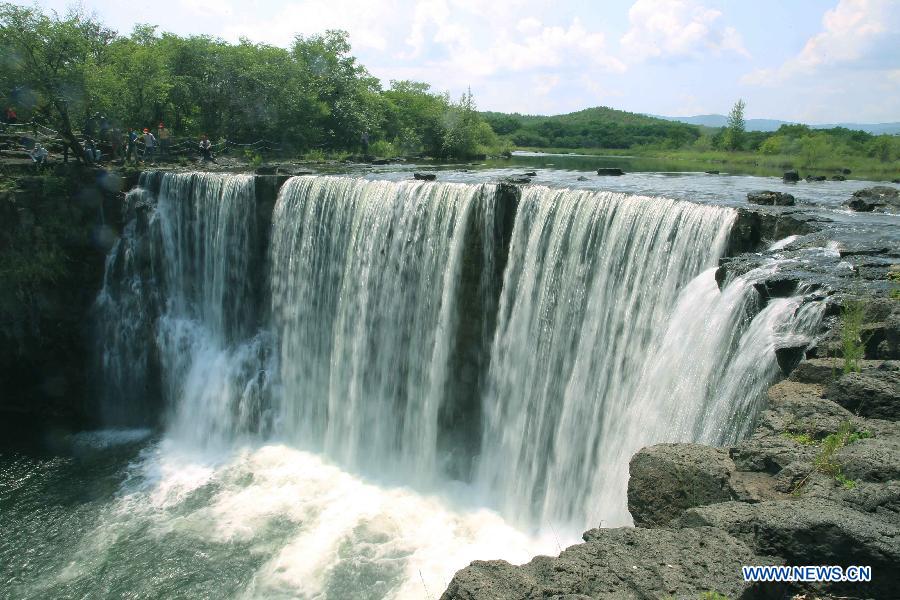 Photo taken on July 7, 2012 shows the scenery of the Jingbo Lake in Ning'an, northeast China's Heilongjiang Province. (Xinhua/Zhang Yanhui) 