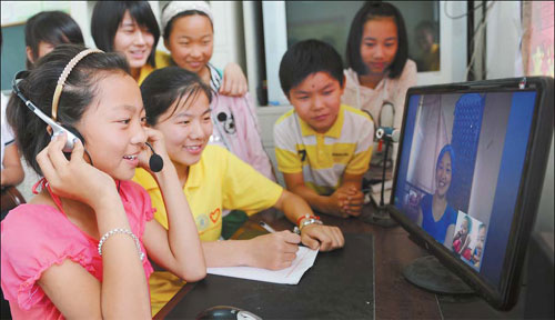 A student chats online with her mother in Jieshou, Anhui province. The number of Chinese Internet users increased 11 percent from a year earlier to 538 million at the end of June, or almost 40 percent of the nation's total population. Wang Biao / For China Daily