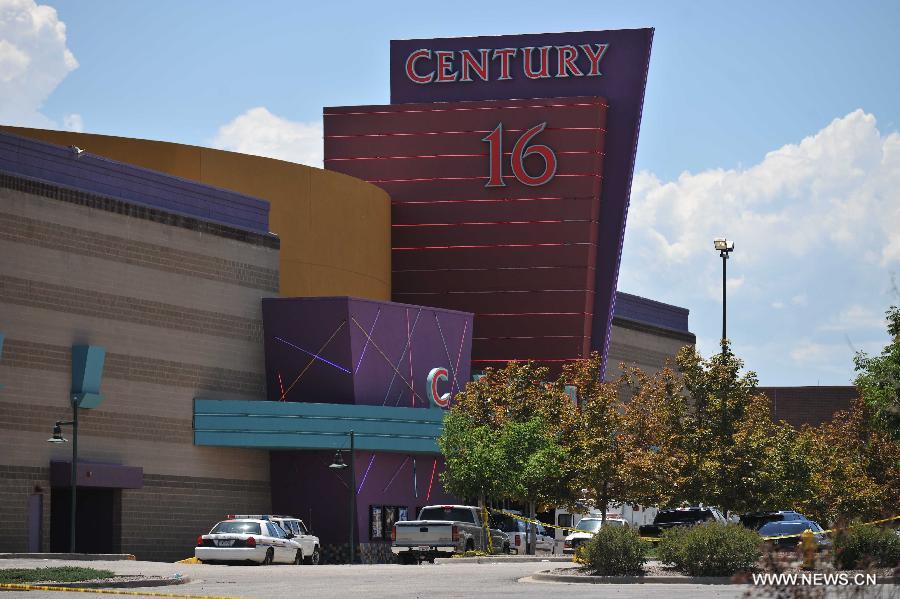 Century 16 Movie Theaters, where the shooting rampage happened, is sealed off in Aurora, Colorado, July 22, 2012. Twelve people were killed and 59 others injured at a Batman movie premier, where a lone, heavily armed gunman burst into a packed theater in a suburb 10 miles east of Denver during the wee hours of Friday. (Xinhua/Yang Lei) 