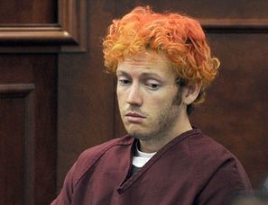 James Holmes appears in court at the Arapahoe County Justice Center July 23, 2012 in Centennial, Colorado. Holmes, 24, is accused of shooting dead 12 people and wounding 58 others at a cinema Friday in Aurora, outside Denver, as young moviegoers packed the midnight screening of the latest Batman film, 'The Dark Knight Rises.' [Xinhua] 