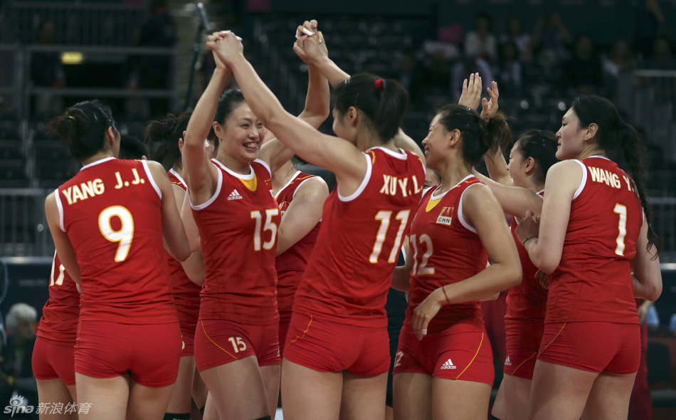 Volleyball players of China celebrate victory. 