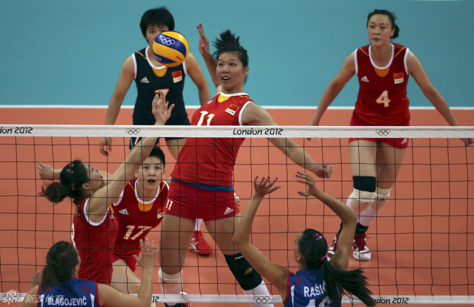 Xu Yunli of China spikes the ball. 