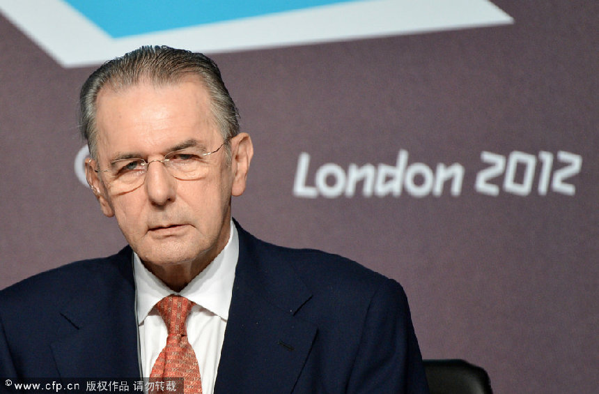 Jacques Rogge, President of the International Olympic Committee, speaks at a news conference in the Olympic Park. [CFP]