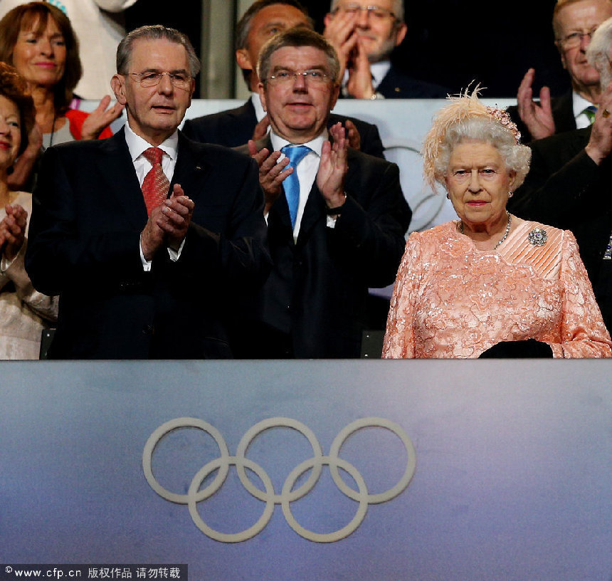 Queen Elizabeth II (R) and Jacques Rogge (L), President of the International Olympic Committee, attend the Opening Ceremony of the London 2012 Olympic Games at the Olympic Stadium on July 27, 2012 in London, England. [CFP]