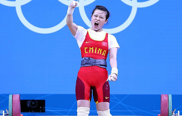 Wang Mingjuan reacts after winning the gold medal.
