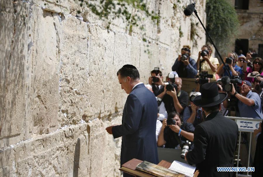 U.S. Republican presidential candidate Mitt Romney visits the Western Wall in Jerusalem on July 29, 2012. 