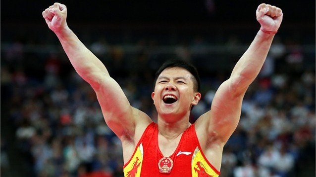 Yibing Chen of China celebrates after competeing on the pommel horse in the Artistic Gymnastics men's Team final on Day 3.