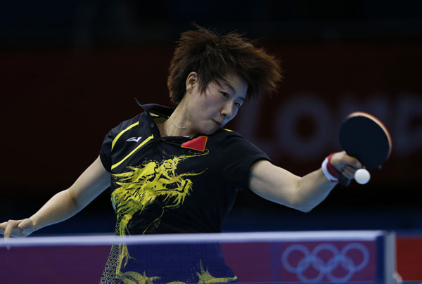 Ding Ning of China competes during women's table tennis individual quarterfinals, at London 2012 Olympic Games in London, Britain, on July 31, 2012. Ding Ning of China defeated Ai Fukuhara of Japan 4-0. [Xinhua]