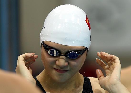 Ye Shiwen of China prepares for the start of the final of women’s 200m individual medley swimming competition, at London 2012 Olympic Games in London, Britain, on July 31, 2012. Ye Shiwen won the gold medal of the event with a time of 2:07.57 and set a new Olympic Games record. [Xinhua]