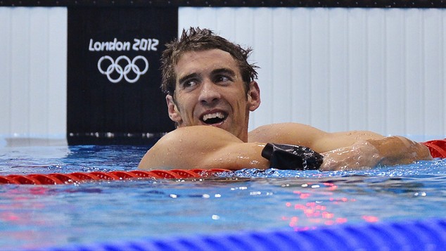 Michael Phelps wins gold in the 4x200m relay to add to his silver in 200m butterfly, setting new Olympic medal record of 19.
