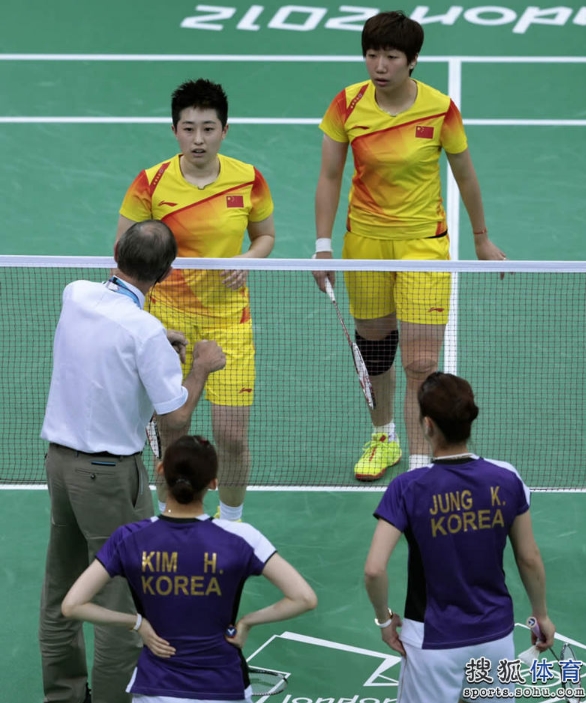The Badminton World Federation has disqualified eight players after accusing them of 'not using one's best efforts to win'. Four pairs of players - two from South Korea and one each from China and Indonesia - are out of the Olympics after their matches on Tuesday. In the photo are Wang Xiaoli and Yu Yang who lost in a suspicious way in women's doubles Tuesday evening at the Wembley Arena.