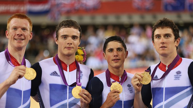  Team GB on the podium proudly displaying their gold medals.
