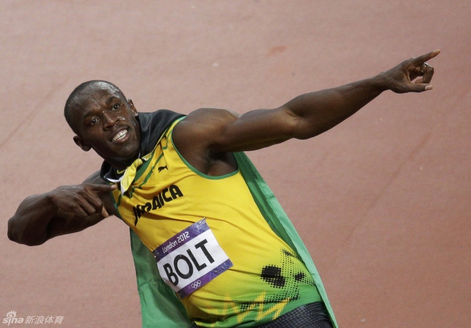 Usain Bolt of Jamaica celebrates winning gold. 