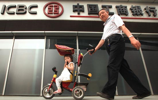 A branch of the Industrial and Commercial Bank of China Ltd in Beijing. China's corporate debt-to-GDP ratio stood at 107 percent in 2011, the highest among all countries, raising concern about their financial stability. [Photo/China Daily]  