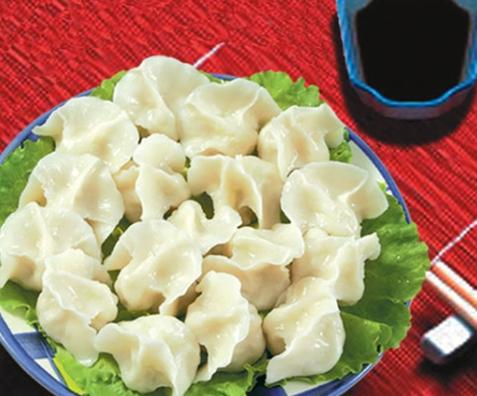 Families traditionally gather to prepare a meal of Jiaozi, or dumplings, for the event.
