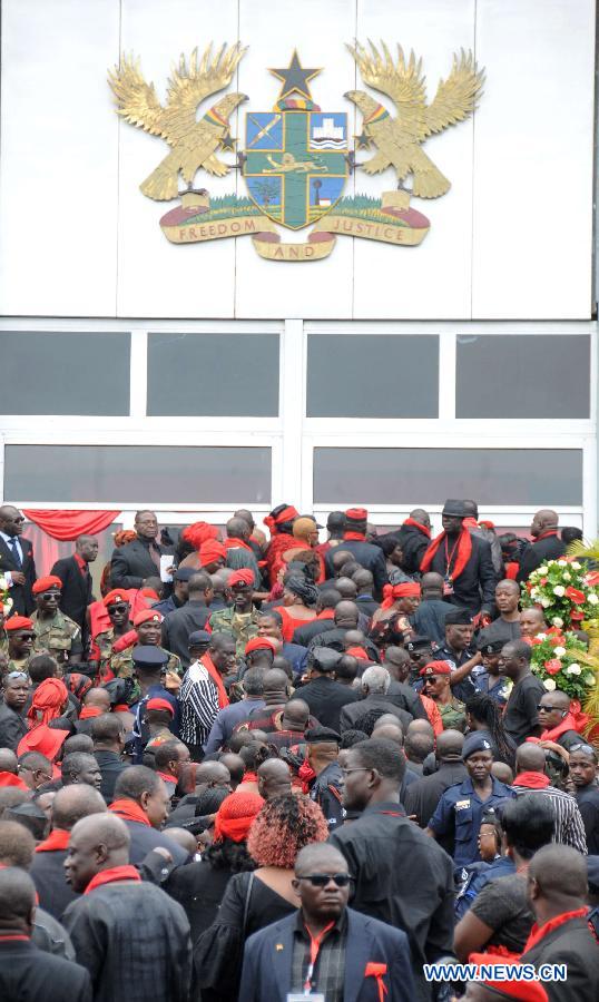 ACCRA, Aug. 8, 2012 (Xinhua) -- Ghana&apos;s government officials and celebrities wait outside the State Banquet Hall to bid farewell to the remains of Ghana&apos;s late president John Evans Atta Mills in Accra, capital of Ghana, on Aug. 8, 2012. The late President Mills, 68, died suddenly on July 24, at the 37th Military Hospital after falling ill. (Xinhua/Shao Haijun) 