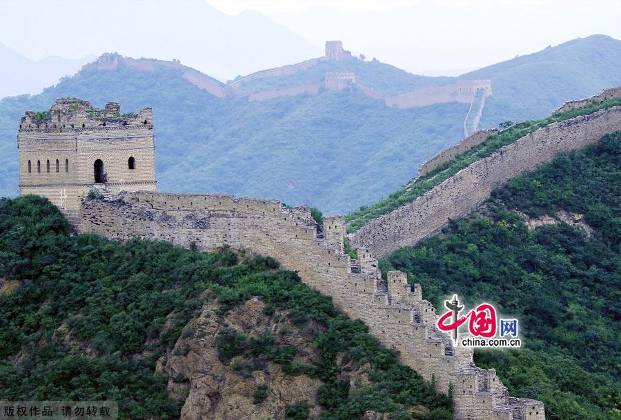 Straddling the demarcation between Hebei province and Beijing, the Jinshanling Great Wall is rich in architectural history and natural scenery. In summer, the temperature here is at least five degrees cooler than in the capital, making it an ideal destination for weekend excursions. This particular section of Great Wall is said to be particularly photogenic. [China.org.cn]