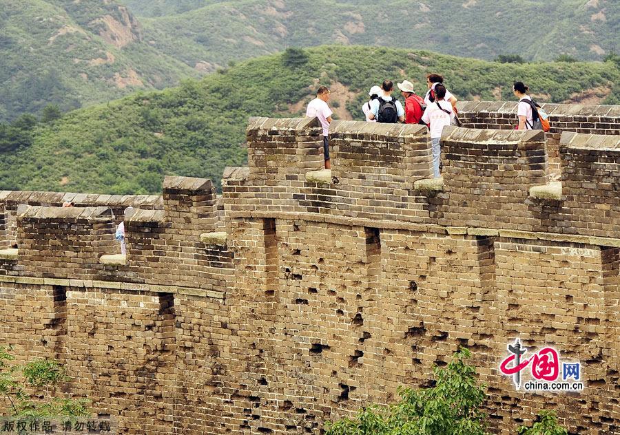 Straddling the demarcation between Hebei province and Beijing, the Jinshanling Great Wall is rich in architectural history and natural scenery. In summer, the temperature here is at least five degrees cooler than in the capital, making it an ideal destination for weekend excursions. This particular section of Great Wall is said to be particularly photogenic. [China.org.cn]