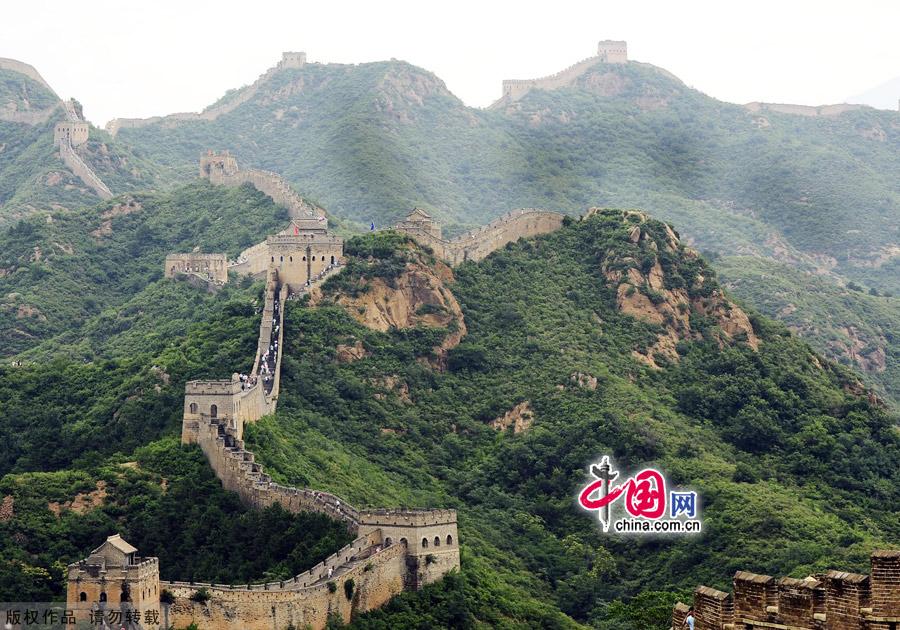 Straddling the demarcation between Hebei province and Beijing, the Jinshanling Great Wall is rich in architectural history and natural scenery. In summer, the temperature here is at least five degrees cooler than in the capital, making it an ideal destination for weekend excursions. This particular section of Great Wall is said to be particularly photogenic. [China.org.cn]