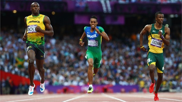 Usain Bolt (left) competes in the men's 200m semi-finals on Day 12 at London 2012.  