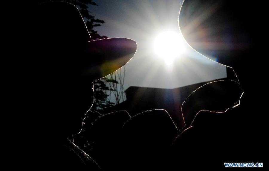 Farmers attend an Ongkor Festival prayer ceremony in Dagze County, southwest China's Tibet Autonomous Region, Aug. 9, 2012