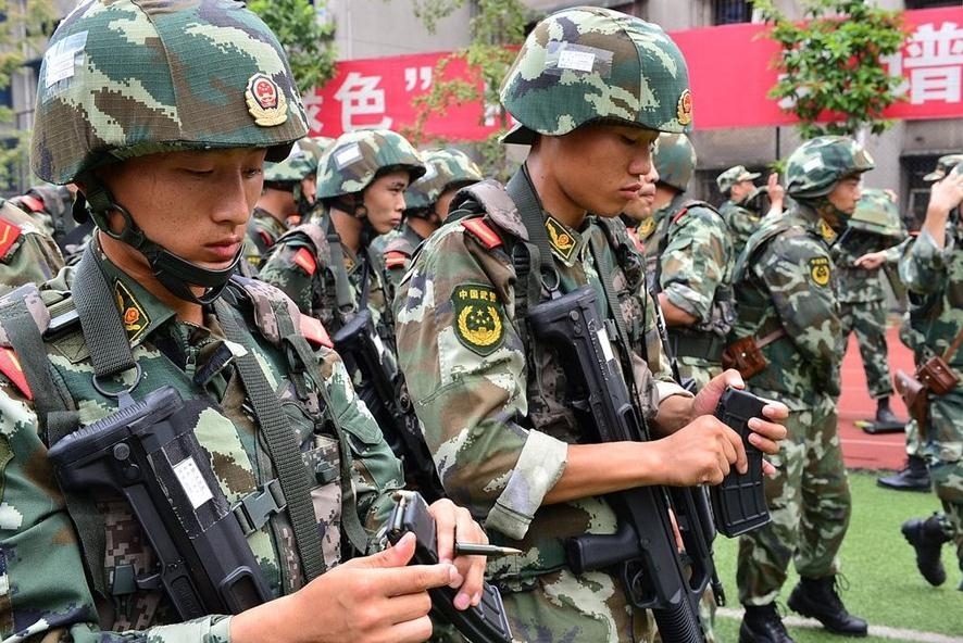 A group of Chongqing police were sent out Friday afternoon to search for suspect robber who shot and killed one person and injured two others on Friday afternoon in Chongqing Municipality, southwest of China. The escaped suspect, named Zhou Kehua, has committed a series of crimes, killed many people, and robbed large sums of cash in Chongqing and provinces of Jiangsu and Hunan since 2004, according to Chongqing Public Security Bureau. [hljtv.com]