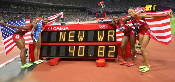 The USA women's 4X100 meters quartet smashed the world record as they won the gold medal in the Olympic Stadium on Friday night. [Xinhua]