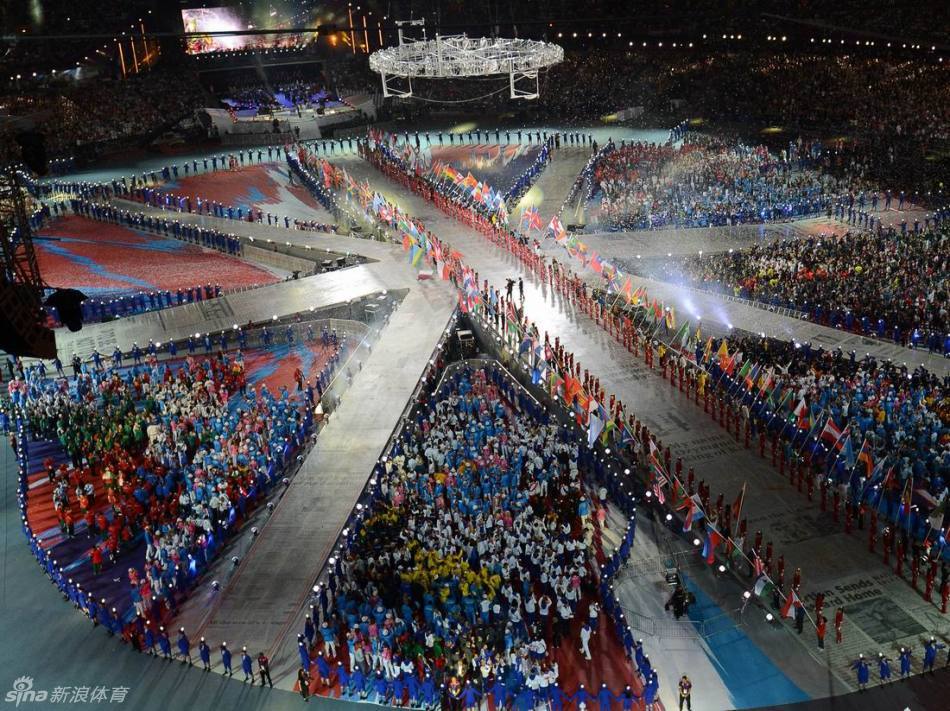 Delegation flags, athletes enter the stadium at the closing ceremony. 