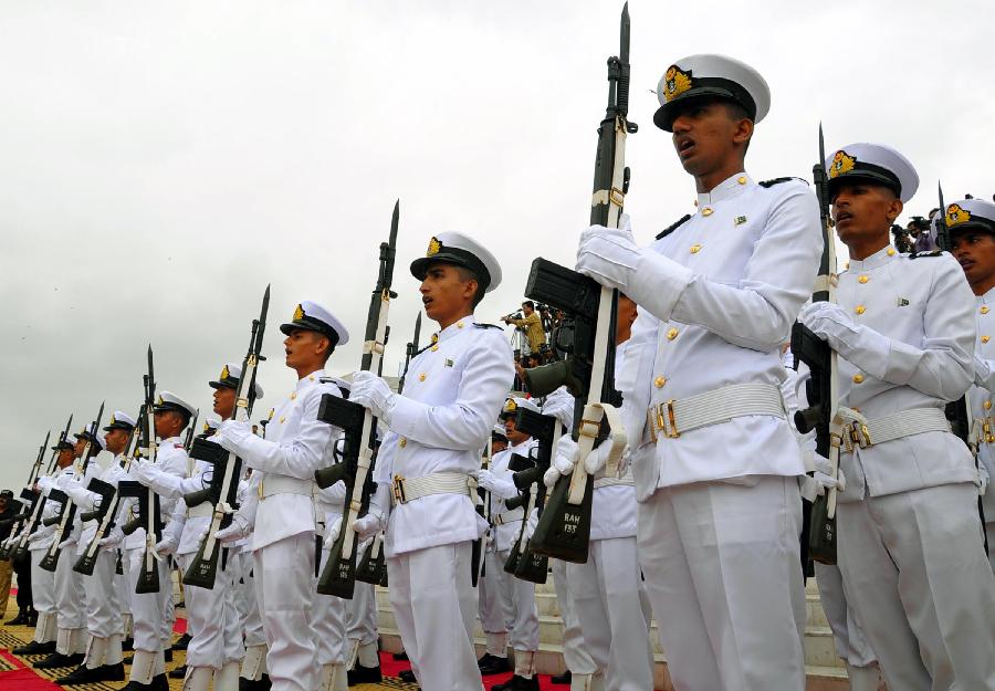 Pakistani Navy cadets stand in formation at the mausoleum of the founder of Pakistan Muhammad Ali Jinnah during a ceremony to mark Pakistan's Independence Day in southern Pakistani port city Karachi, on Aug. 14, 2012. 