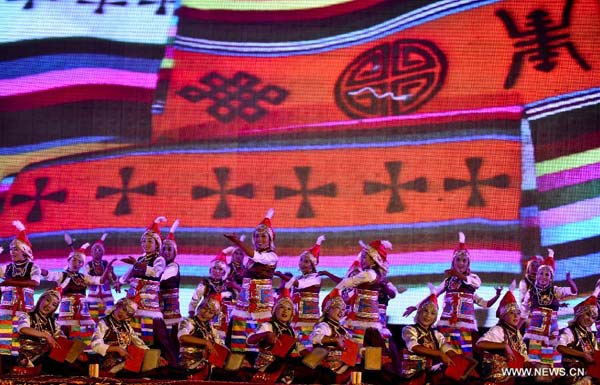 Actors perform during the opening ceremony of 2012 Tibet Yarlung Cultrual Festival in Zetang county of Shannan prefecture, southwest China's Tibet autonomous region, Aug 15, 2012. The festival which kicked off on Wednesday, will last until Aug 21.