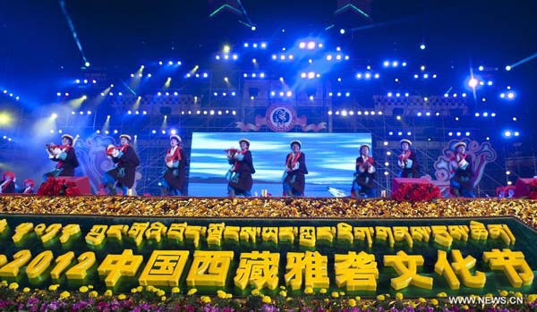Actors perform during the opening ceremony of 2012 Tibet Yarlung Cultrual Festival in Zetang county of Shannan prefecture, southwest China's Tibet autonomous region, Aug 15, 2012. The festival which kicked off on Wednesday, will last until Aug 21.[
