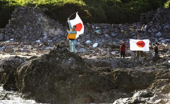 At least nine Japanese activists have illegally landed on China's Diaoyu Islands, local media reported. 