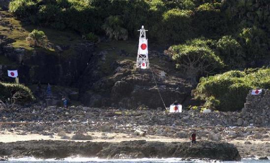 At least nine Japanese activists have illegally landed on China's Diaoyu Islands, local media reported.