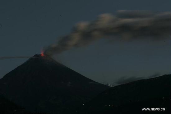 Tungurahua volcano spews lava and ash in Banos, Ecuador, on Aug. 20, 2012. Due to the increasing activity of the volcano, local authorities declared an orange alert and evacuated nearby residents. [Xinhua]