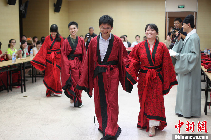 Celebration activity is held for the upcoming Qixi Festival on Aug. 22, 2012 in Shanghai. Qixi Festival, a traditional day of romance in China, falls on the seventh day of the seventh lunar month, and this year it falls on Thursday, Aug. 23, 2012.